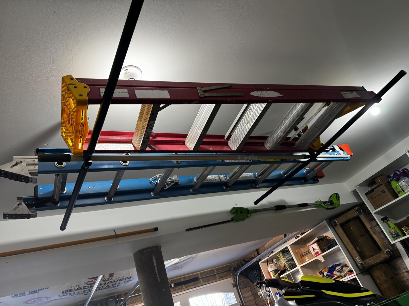 StoreYourBoard Adjustable Overhead Ladder Rack – Garage Organizer Ladder Shelf for Step & Extension Ladders - Storage Racks and Shelving for Garage Organization - Ceiling Mounted - Holds 150 lbs customer photo 1
