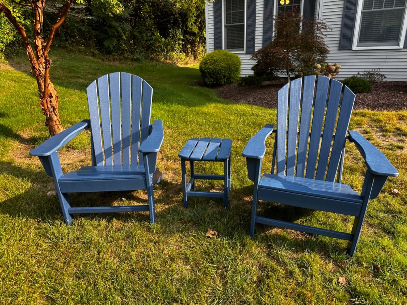 Signature Design by Ashley 1-Piece HDPE Outdoor Adirondack Chair, Driftwood | Durable weather resistant HDPE, 36-pound stationary frame, Comfortable 16.25-inch elevated seat, Sundown Treasure Series customer photo 1