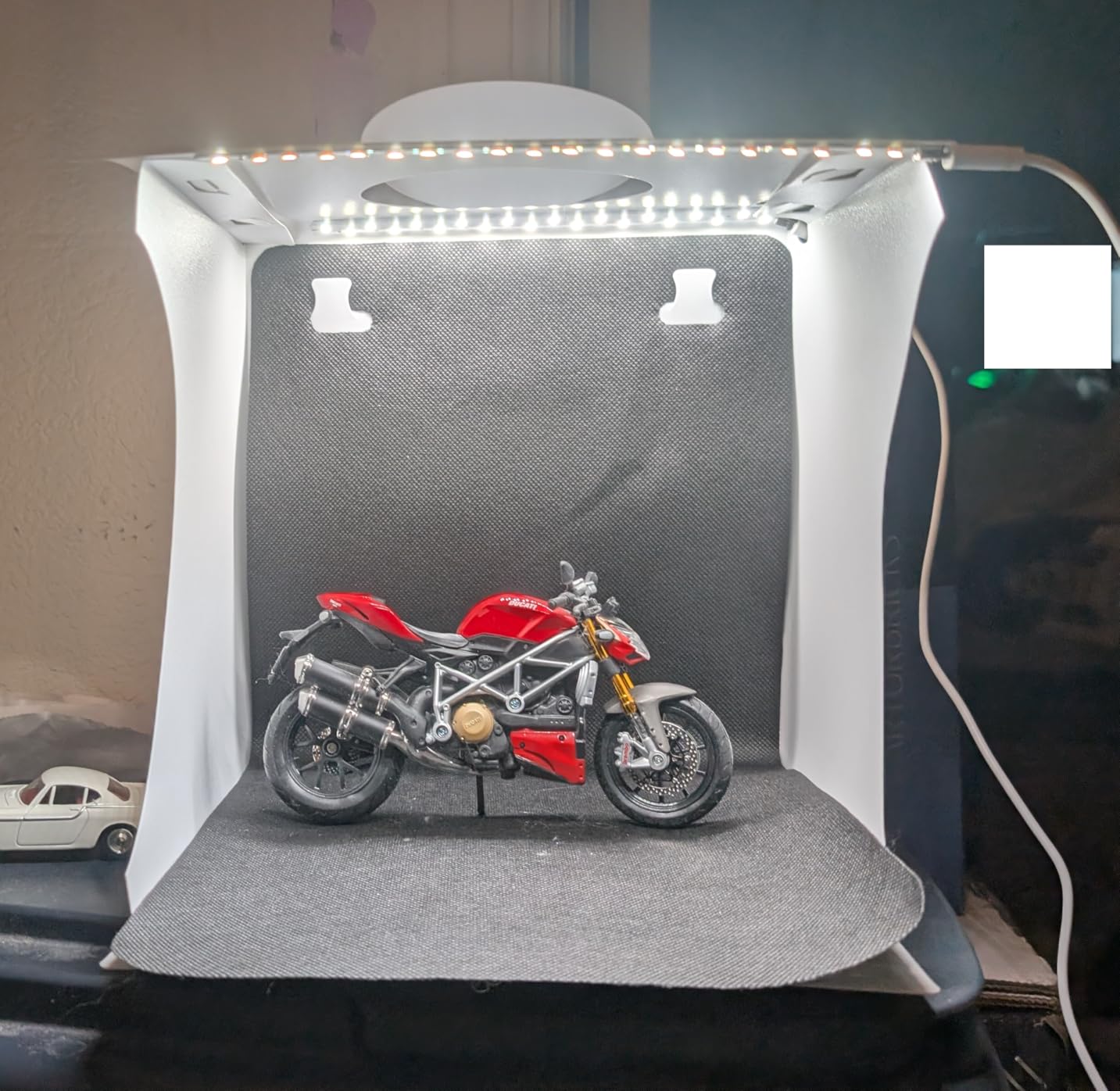 DUCLUS Mini Photo Studio Light Box,Portable Folding Photography Light Tent kit with 40pcs LED Light + 6 Kinds Color Backgrounds for Small Size Products customer photo 1