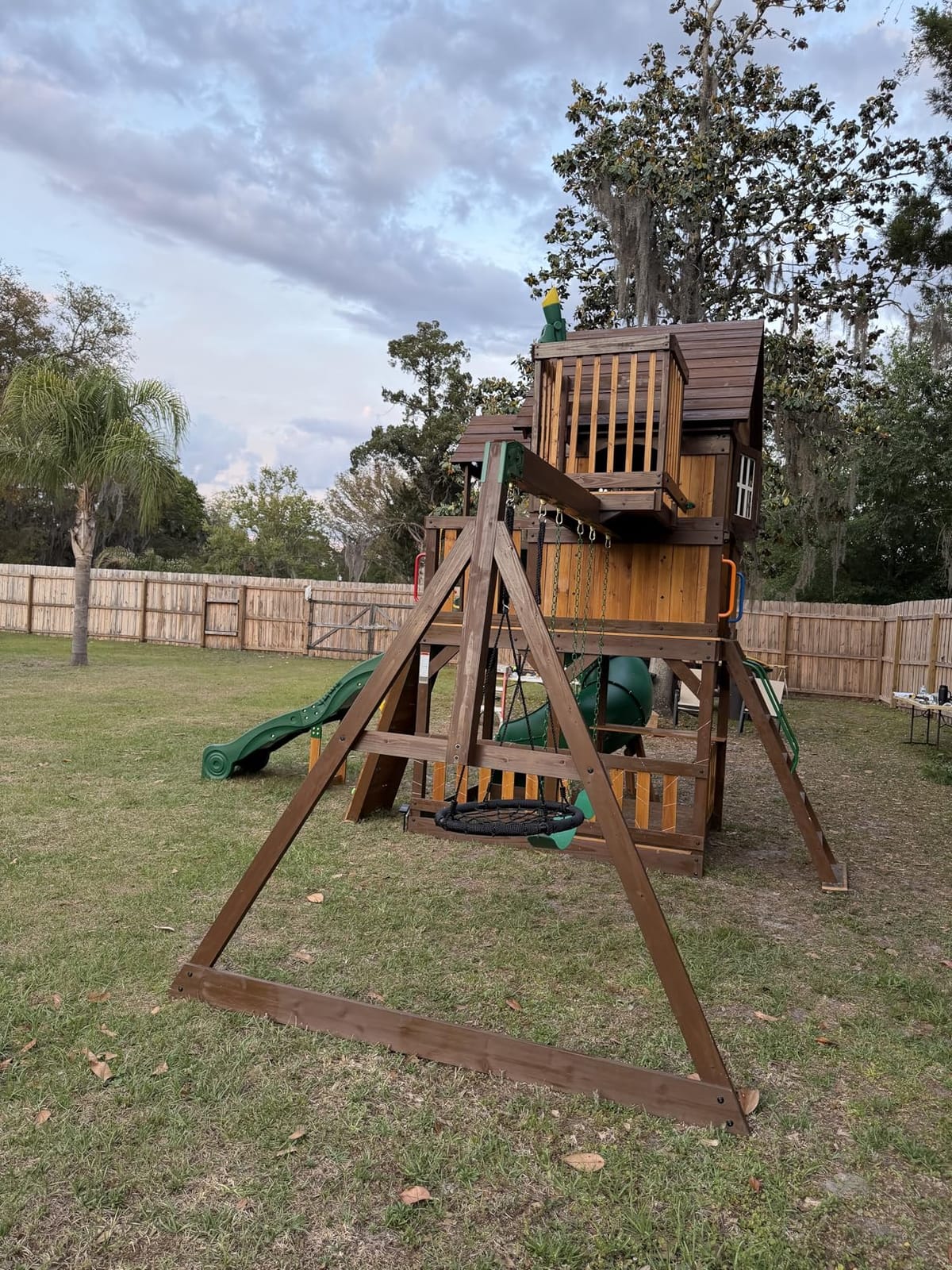 Backyard Discovery Skyfort All Cedar Swing Set, Elevated Covered Wood Roof Clubhouse with Bay Windows, 2 Belt Swings, Web Swing, 10ft Wave Slide, 5 ft Tube Slide, Covered Picnic Table, 5 ft Rock Wall customer photo 2