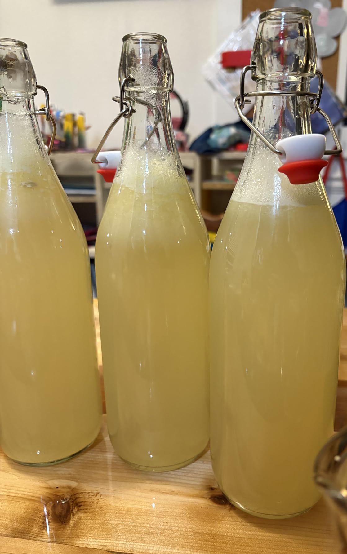 8 PACK [1 Liter/33 fl. oz.] Swing Top Glass Bottles w/ 2 Funnels & Pourers | Airtight Flip Top Brewing Fermentation Bottle for Beverages, Kombucha, Soda, Beer, Coquito, Kefir, Wine, Carbonated Drinks customer photo 1